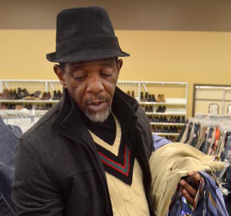 JERREY ROBERTS Antonio Johnson talks about his approach to fashion as he displays silk ties he picked out at Savers in Springfield Tuesday. - JERREY ROBERTS | DAILY HAMPSHIRE GAZETTE
