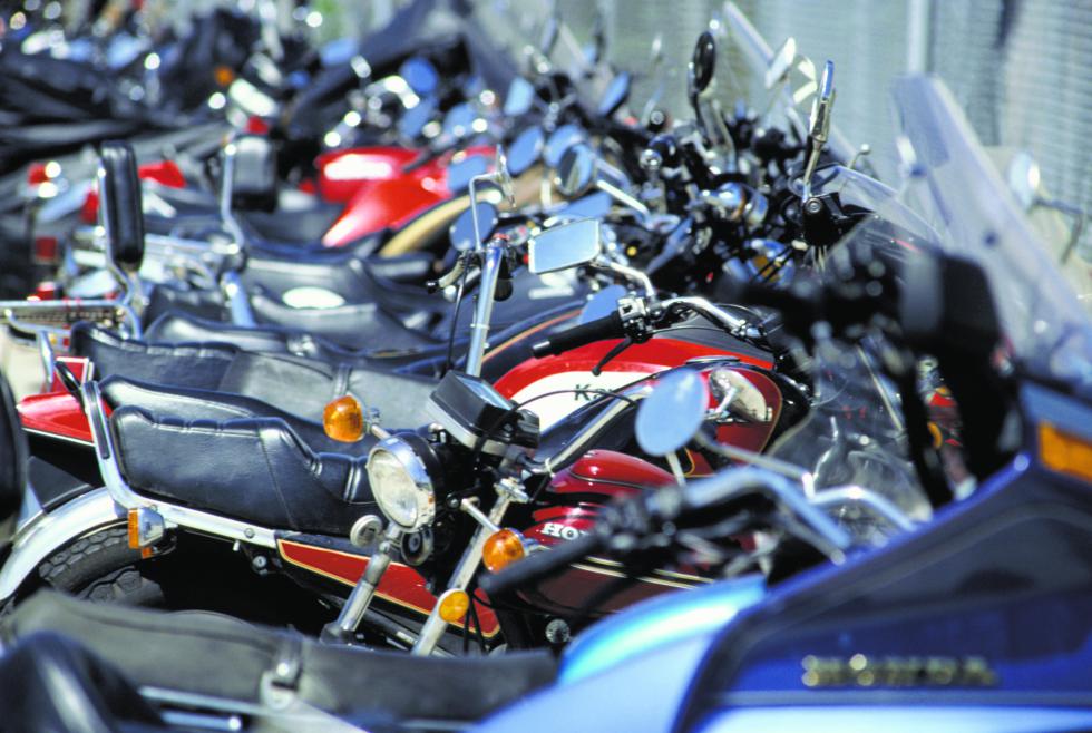 Motorcycles in row, (Close-up) - DC Productions | Photodisc
