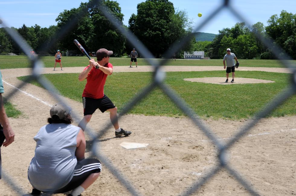 KEVIN GUTTING Jason's Home Repair takes on Atalasoft Docubots in a Northampton Parks and Recreation Co-ed Summer Softball League game on Sunday afternoon at the Ray Ellerbrook Athletic Fields. - KEVIN GUTTING | Daily Hampshire Gazette
