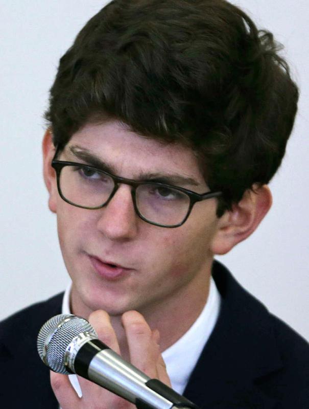 Former St. Paul's School student Owen Labrie scratches his chin while he testifies during his trial at Merrimack Superior Court in Concord, N.H., Wednesday, Aug. 26, 2015. Labrie is charged with raping a 15-year-old freshman as part of Senior Salute, in which seniors try to romance and have intercourse with underclassmen before leaving the prestigious St. Paul's School in Concord. The defense contends the two had consensual sexual contact but not intercourse. (AP Photo/Charles Krupa, Pool) - Charles Krupa | AP