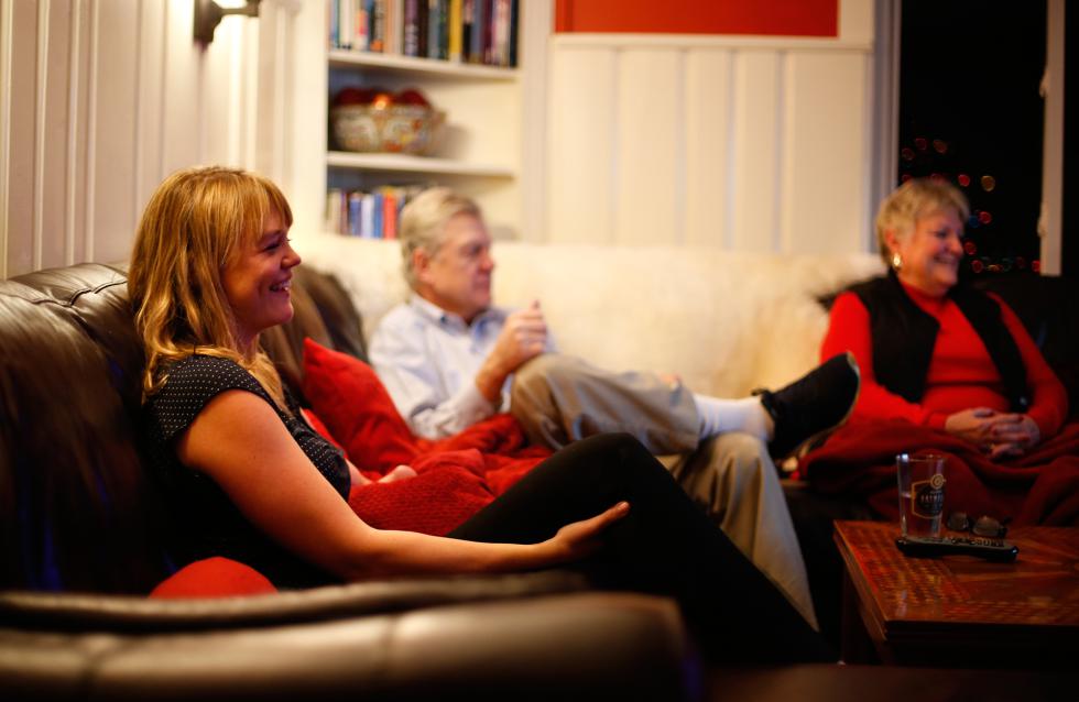 DAN LITTLE Maggie Baumer, left, watches Jeopardy with her parents Donald and Polly Baumer Thursday night in Florence. - DAN LITTLE | DAN LITTLE
