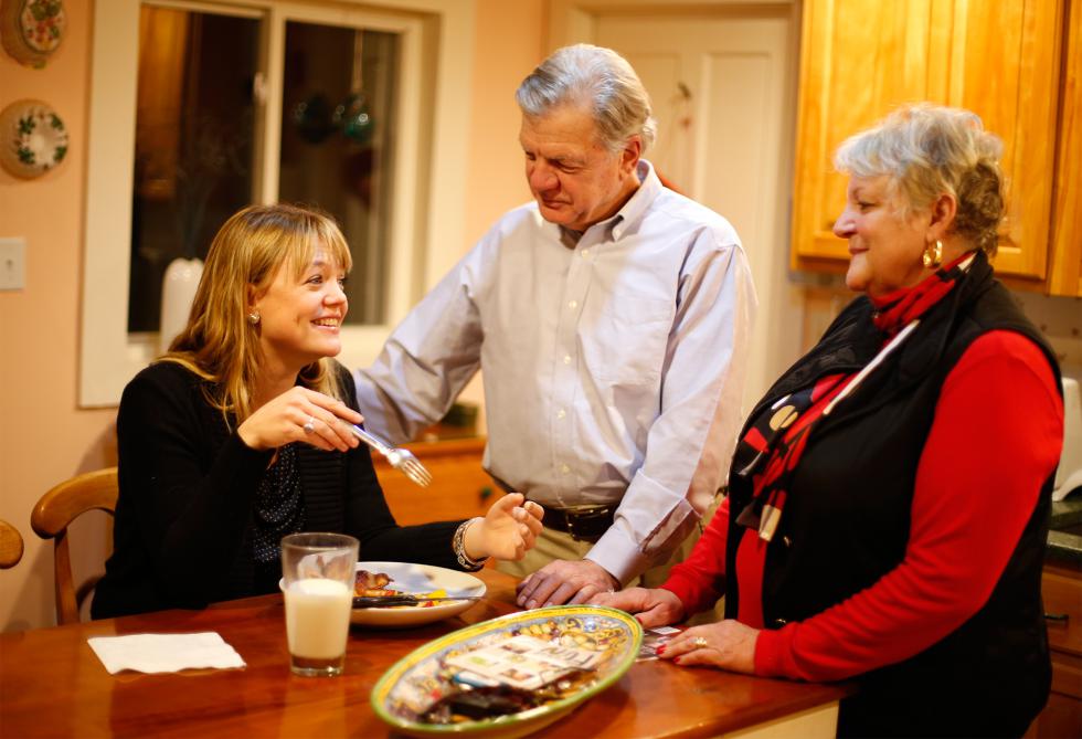 DAN LITTLE Maggie Baumer, left, with her parents Donald and Polly Baumer Thursday night in Florence. - DAN LITTLE | DAN LITTLE
