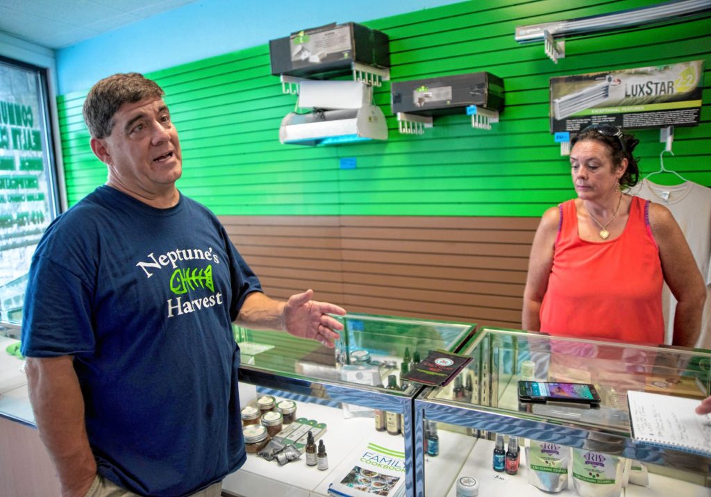 Gazette Staff/Andrew Whitaker—Andrew J. Whitaker/Gazette StaffPotco owner David Mech, left, and Violet Hall, right, owner of Ora Care talk about the Potco store Wednesday, August 11, at Potco at 522 Sumner in Springfield.