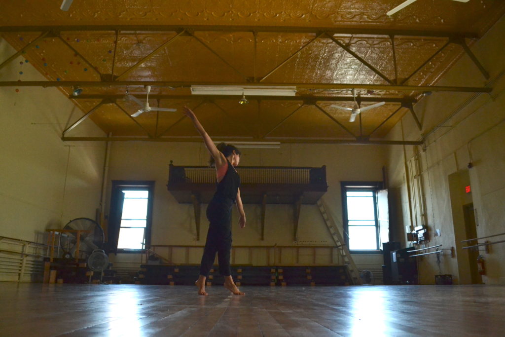 Katie Martin dances at the SChool for Contemporary Thought, on the fourth floor of the Masonic Building in Northampton. Hunter Styles Photo.