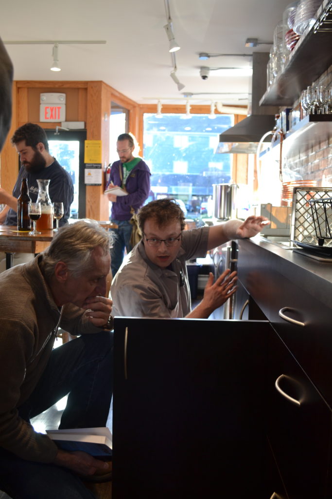 Beerology is now open on Pleasant Street in Northampton. Above, owner Mike Schilling provides a look at the homebrew hub's setup. Hunter Styles photo.