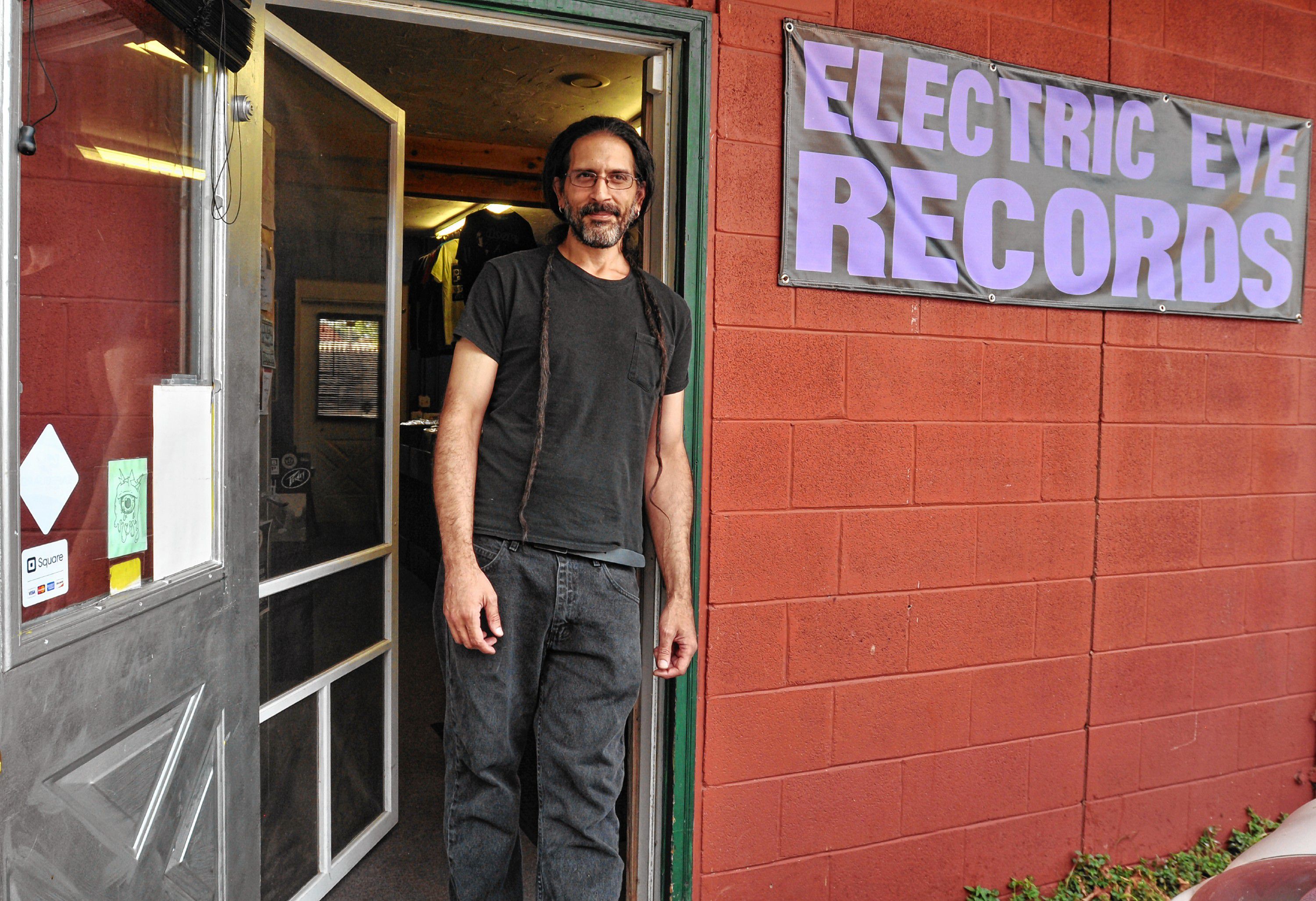 Andy Crespo in front of Electric Eye Records in Florence. ⋆ Valley Advocate