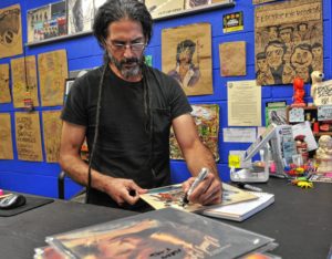 Andy Crespo in front of Electric Eye Records in Florence.