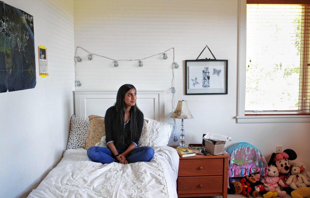Amherst resident Maha Awaisi, in her bedroom. Amanda Herman photo