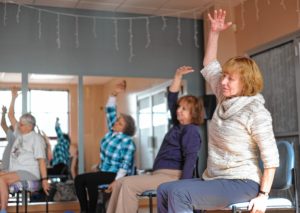 From left, Suzanne Carlson of Greenfield, Kim Audette of Sunderland, Mary Kennedy of Gill and Karen Latka of Montague participate in a yoga class for people dealing with cancer at the Greenfield YMCA.   February 22, 2017.
