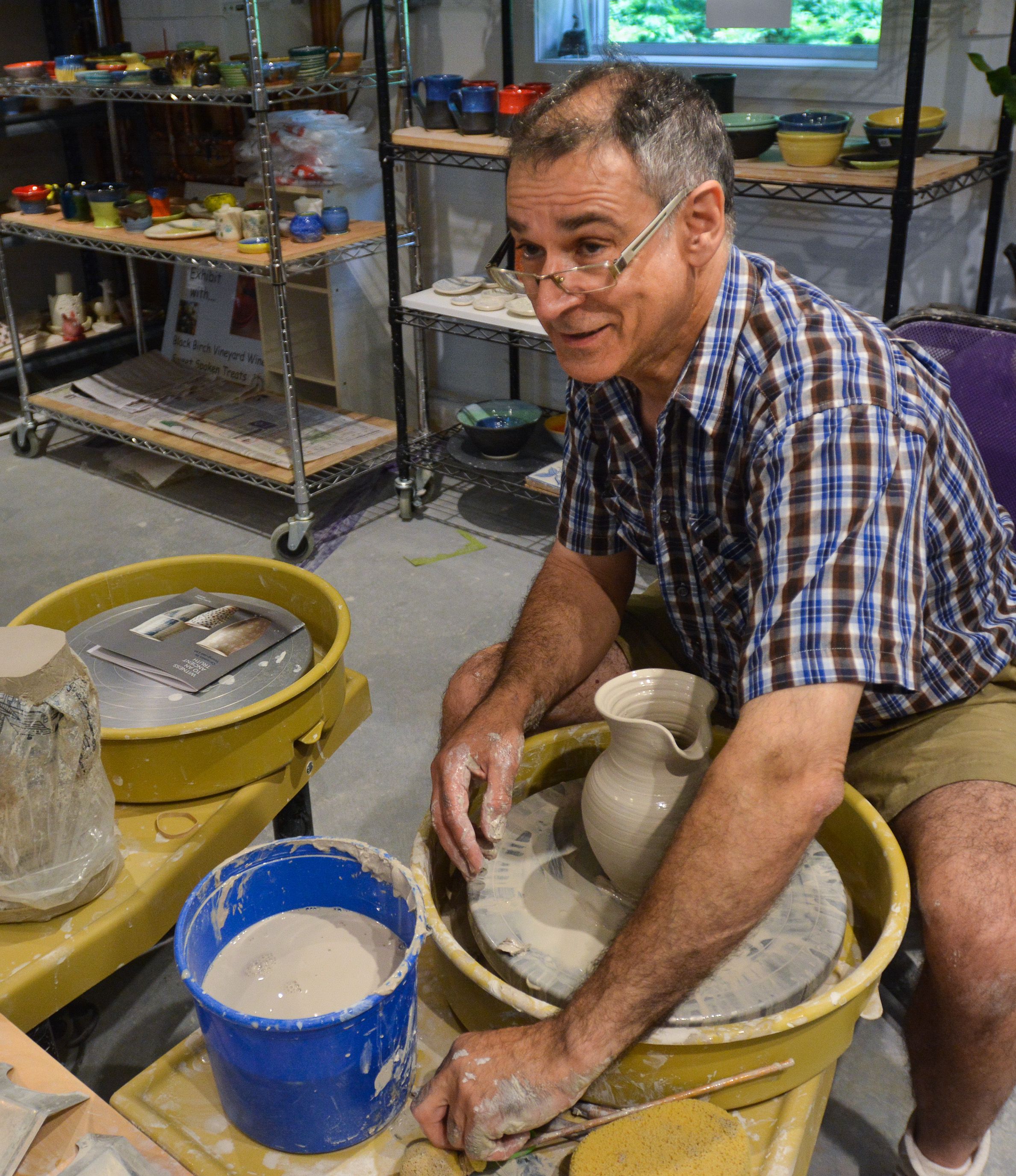 Andrew Quient works on a pitcher in his studio in Florence, June 28. ⋆ ...