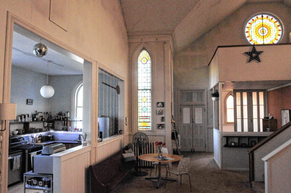 Kitchen and entrance area. Boon and Caro Sheridan bought this 19th century Methodist Church in Holyoke about 18 months ago.