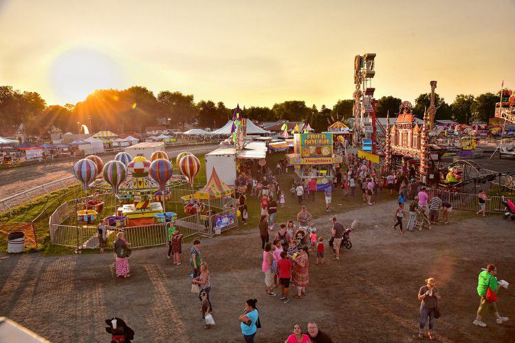 A view of Rockwell Amusements midway at sunset at the Three County Fair Saturday, Sept. 3, in Northampton.