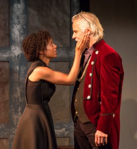 Nehassaiu deGannes and John Hadden in The Last Wife