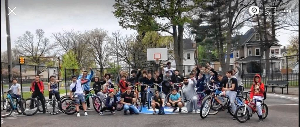 A photo of the members of 413 Bikelife with Ward 1 City Councilor Adam Gomez.