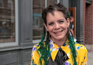 Candice Pelletier, a recent graduate from the Bard Microcollege Holyoke, in front of the Holyoke Chamber of Commerce where she is now employed.