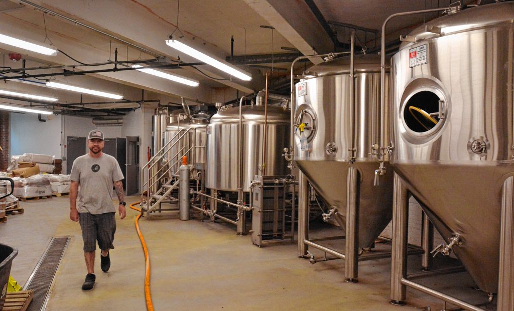 Todd Sullivan, who is the head brewer at Progression Brewing Company in Northampton, in the brewing room, Tuesday, May 28, 2019.