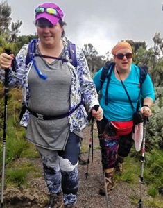 Christa Singleton, left and Eve Bogdanove, right, hiking up Mount ...