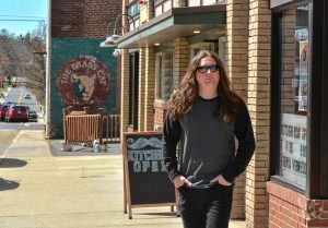 Jonathan Donais, who plays in the bands Anthrax and Shadows Fall, walks along Cottage Street in Easthampton near the Brass Cat and Se7ens, Wednesday, April 17, 2019.