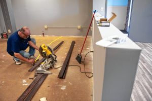 Frank Dailey, owner of Boston Bud Factory in Holyoke, works on the space that will be opening soon.