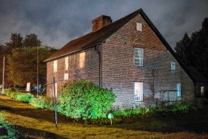 A view of the 1754 Josiah Day House on Elm Street in West Springfield during an investigation by Agawam Paranormal on Saturday evening, Sept. 14, 2019. The building, managed by the Ramapogue Historical Society, is said to be the oldest standing example of a brick saltbox design in the country.