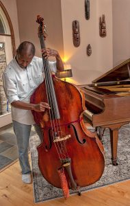 Sharpe, seen here in Plainfield home, is an acclaimed bassist who has played and recorded with a host of jazz legends, from McCoy Tyner to Wynton Marsalis.