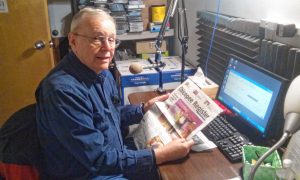 David Manning reads from the “Chicopee Register” at Valley Eye Radio’s Springfield studios.
