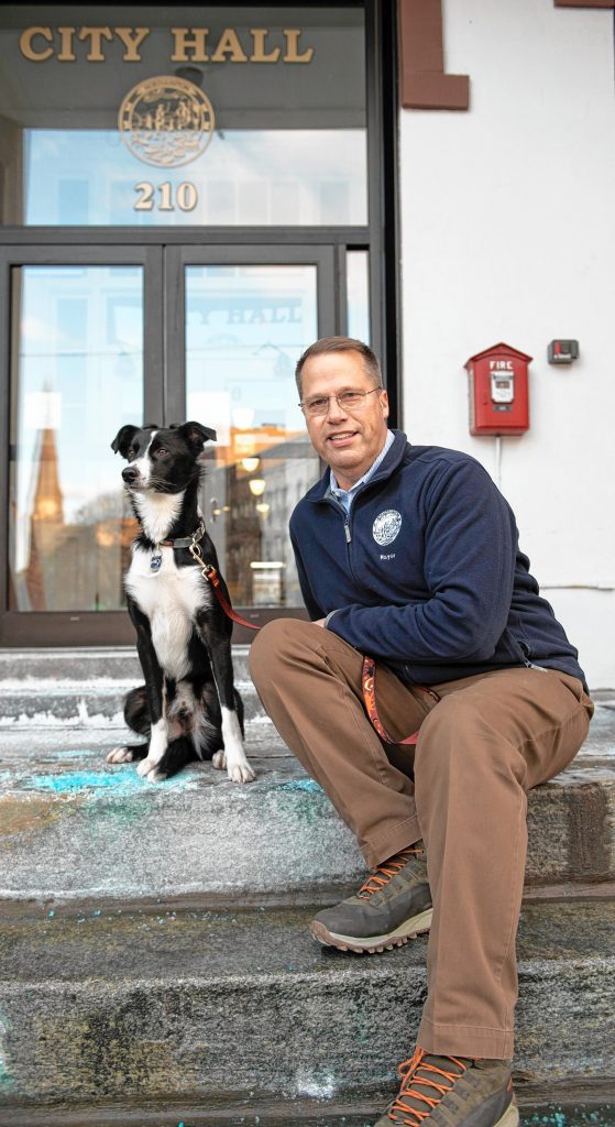 Northampton Mayor David Narkewicz, and his dog Scout, in front of the Northampton City Hall on Feb. 11.