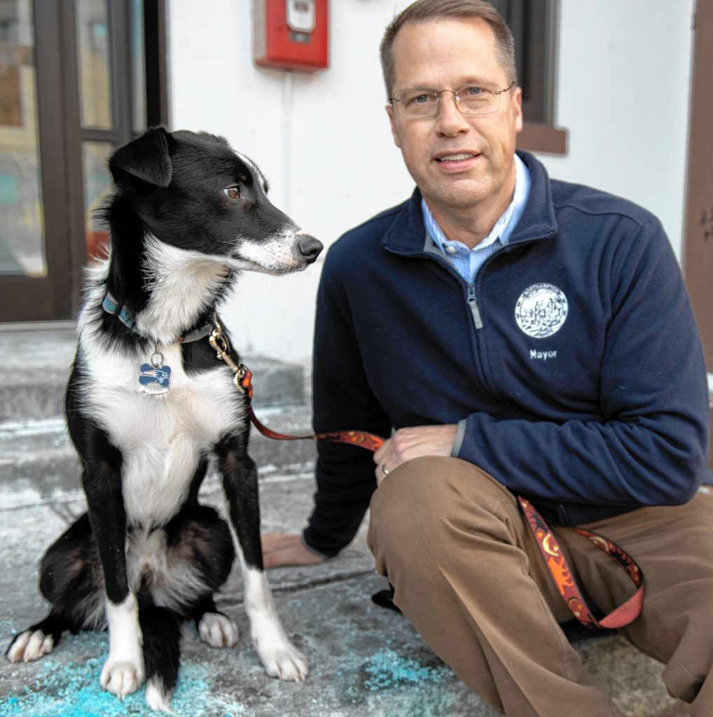 Northampton Mayor David Narkewicz, and his dog Scout, in front of the Northampton City Hall on Feb. 11.