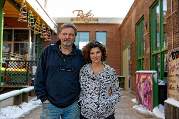Gateway City Arts co-directors Vitek Kruta, left, and Lori Divine are shown outside the venue Jan. 19, 2018 in Holyoke. The urban arts hub shut down during the pandemic.