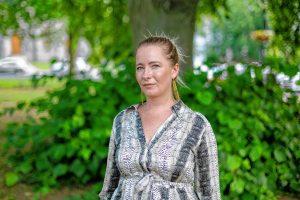 Reparations for Amherst (R4A) Co-Founder Michele Miller of Amherst stands outside a Juneteenth Community Jubilee Celebration in the town common, Saturday in Amherst, MA.