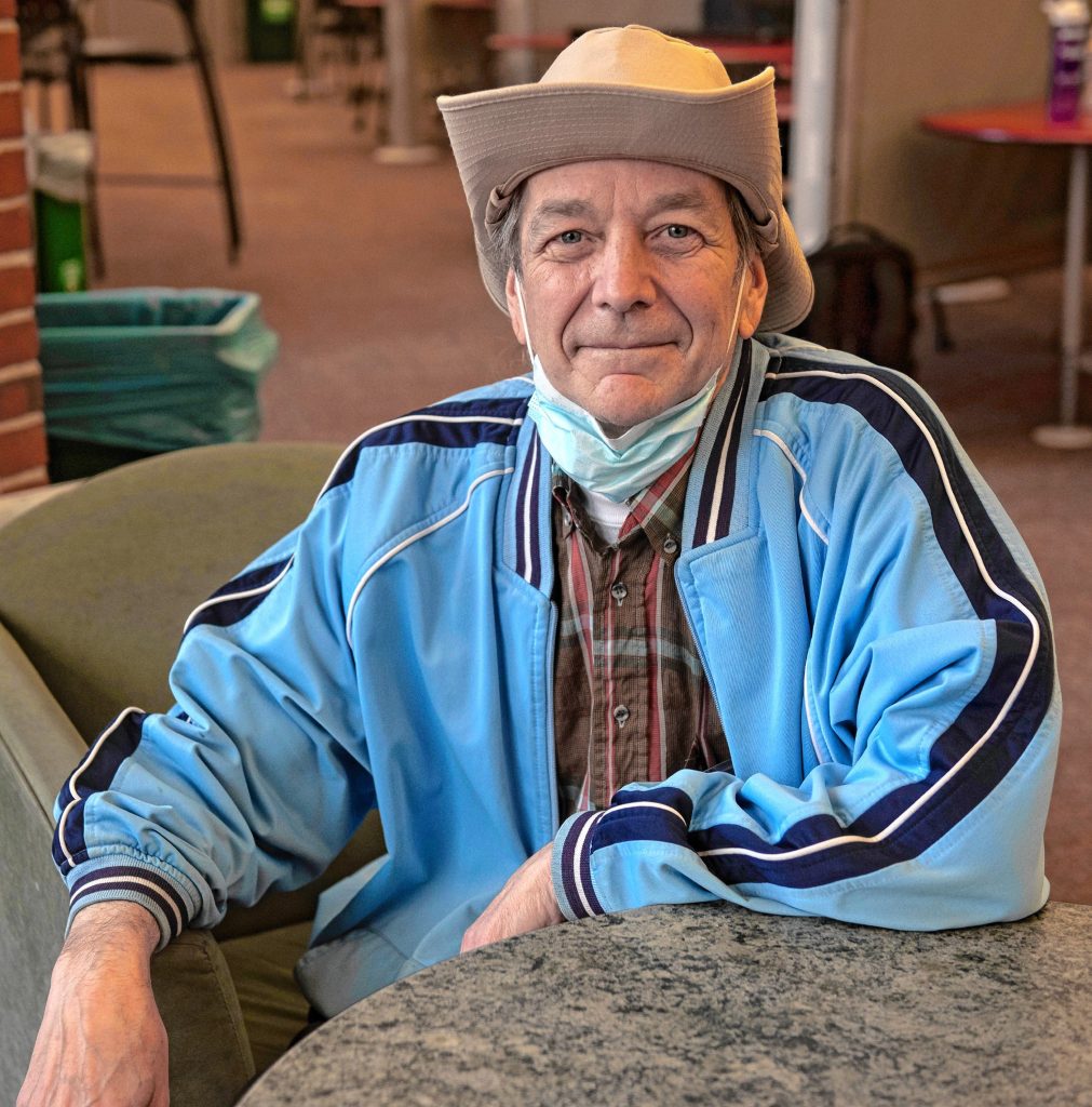 Terry Frankilin at the W.E.B. Du Bois Library at UMass, where he often goes to use the computer and work on his novel. Franklin is a longtime activist and an organizer of Extravaganja who for years pushed to legalize marijuana in Massachusetts. Voters agreed five years ago.