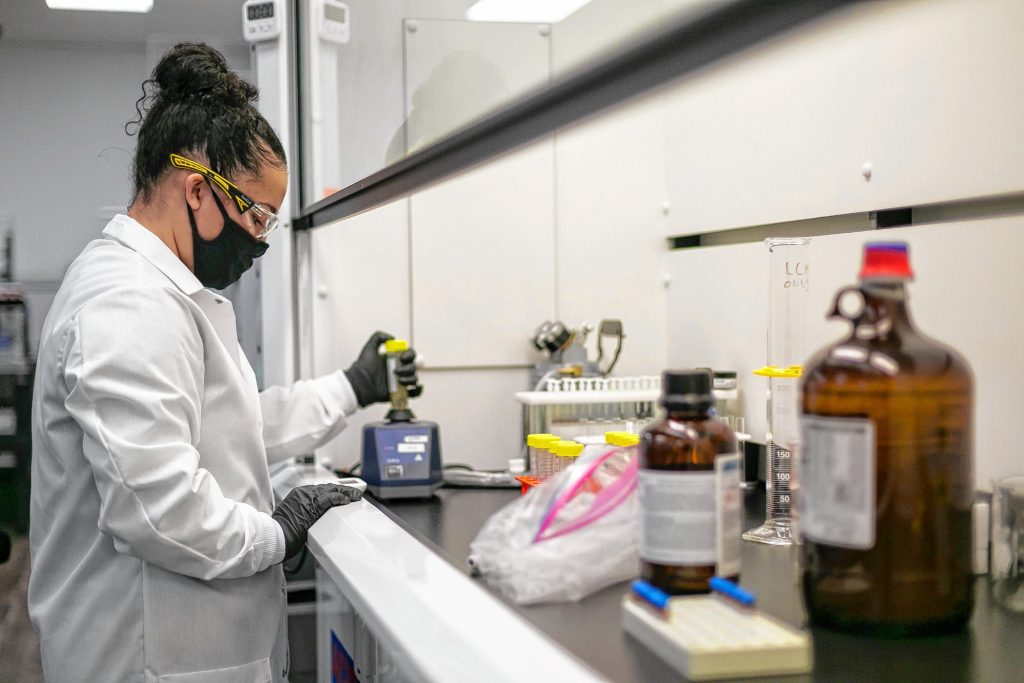 Pesticide Lab Analyst Danica Mondon-Poirier of Springfield prepares a sample of marijuana flower for testing at the Analytics Lab independent cannabis testing facility in Holyoke.