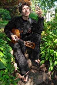 Russell Brooks, or Lord Russ, at his home in Northampton. When I asked why the gorilla suit, he answered, " well I had a white robe but felt like it  was to serious so here I am."