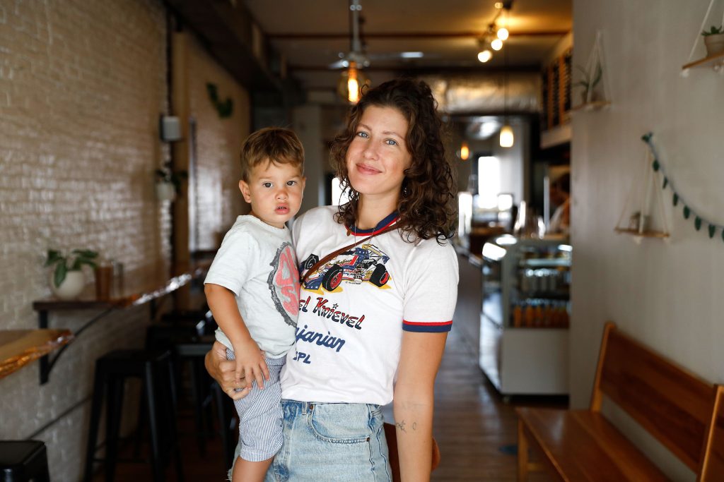 Cafe Balagan co-owner Rachael Workman with her 22-month-old son Rio on Wednesday morning in Northampton.