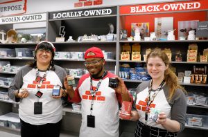 Budtenders Kennedy Layfield, from left, Trevor Hickson and Sarah Kampe show some of their favorite products at 6 Brick’s cannabis retail store on Tuesday afternoon in Springfield.