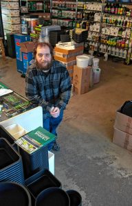 Justin Wells, manager of Liquid Sun Hydroponics in Holyoke.