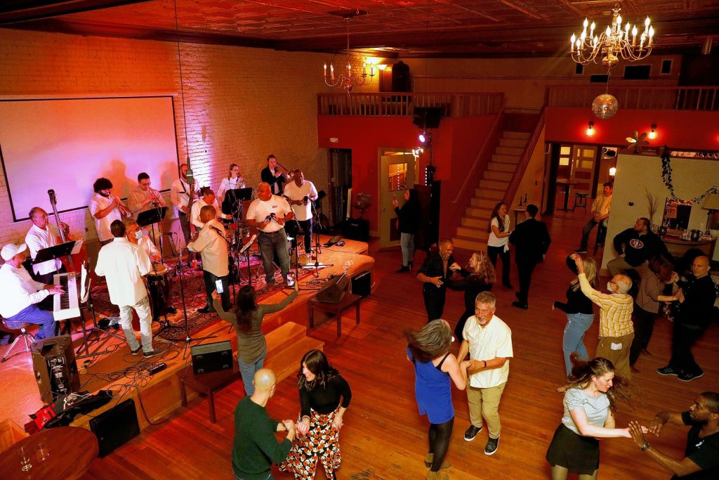 The Salsa Train Orquestra performs to the crowd of paired off dancers Friday night at Marigold Theater in Easthampton.