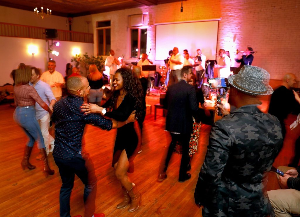 Dancers take to the floor as the Salsa Train Orquestra performs Friday night at Marigold Theater in Easthampton.