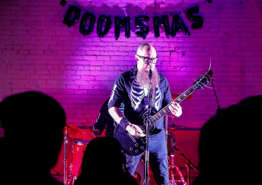 Robert Ives performs with the band Problem With Dragons at the Doomsmas event at the Marigold Theater in Easthampton.