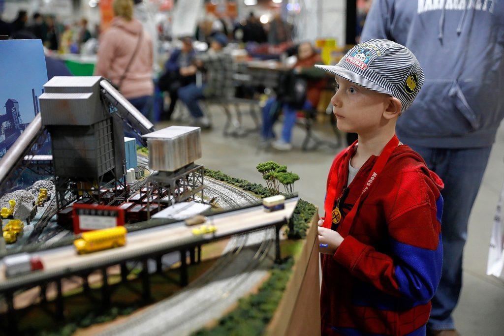 Willem Gloss, 7, checks out an exhibit at the annual Railroad Hobby Show, produced by the Amherst Railway Society at the Eastern States Exposition grounds in West Springfield.