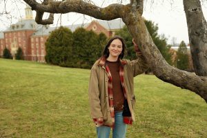 Elizabeth Mawrey, 20, who is a junior english major at UMass and president of the Cannabis Education Coalition, stands for a portrait Friday afternoon at the Orchard Hill section of campus in Amherst.