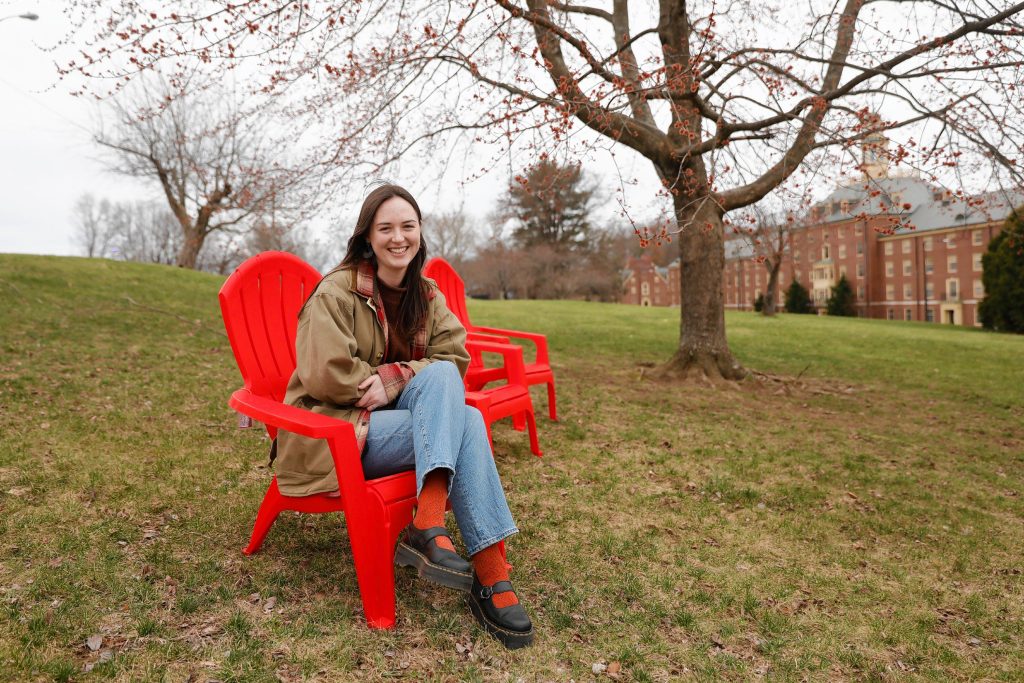 Elizabeth Mawrey, 20, who is a junior english major at UMass and president of the Cannabis Education Coalition, sits for a portrait Friday afternoon at the Orchard Hill section of campus in Amherst.